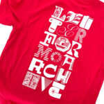 Photo of red t-shirt back with the words “LETTERFORM ARCHIVE” in three columns of letters from various sources.