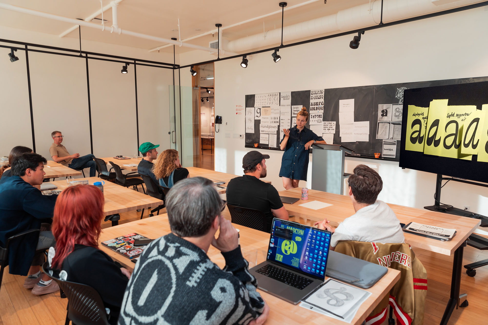 photo of a classroom where people are learning type design