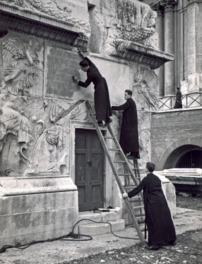 Catich making a rubbing of Trajan inscription ca. 1950.