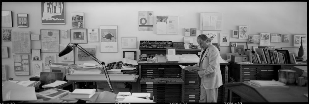 panoramic photo of Jack Stauffacher at his studio, Greenwood Press, 300 Broadway in San Francisco. Photo: Dennis Letbetter, 1991
